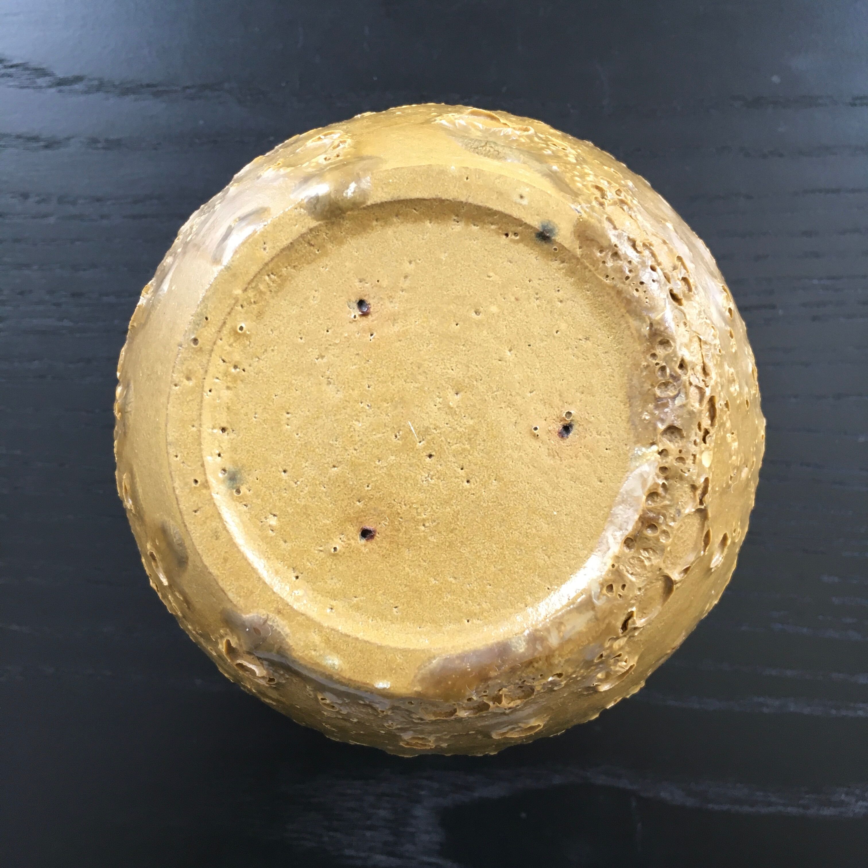 Relief crater ball vase