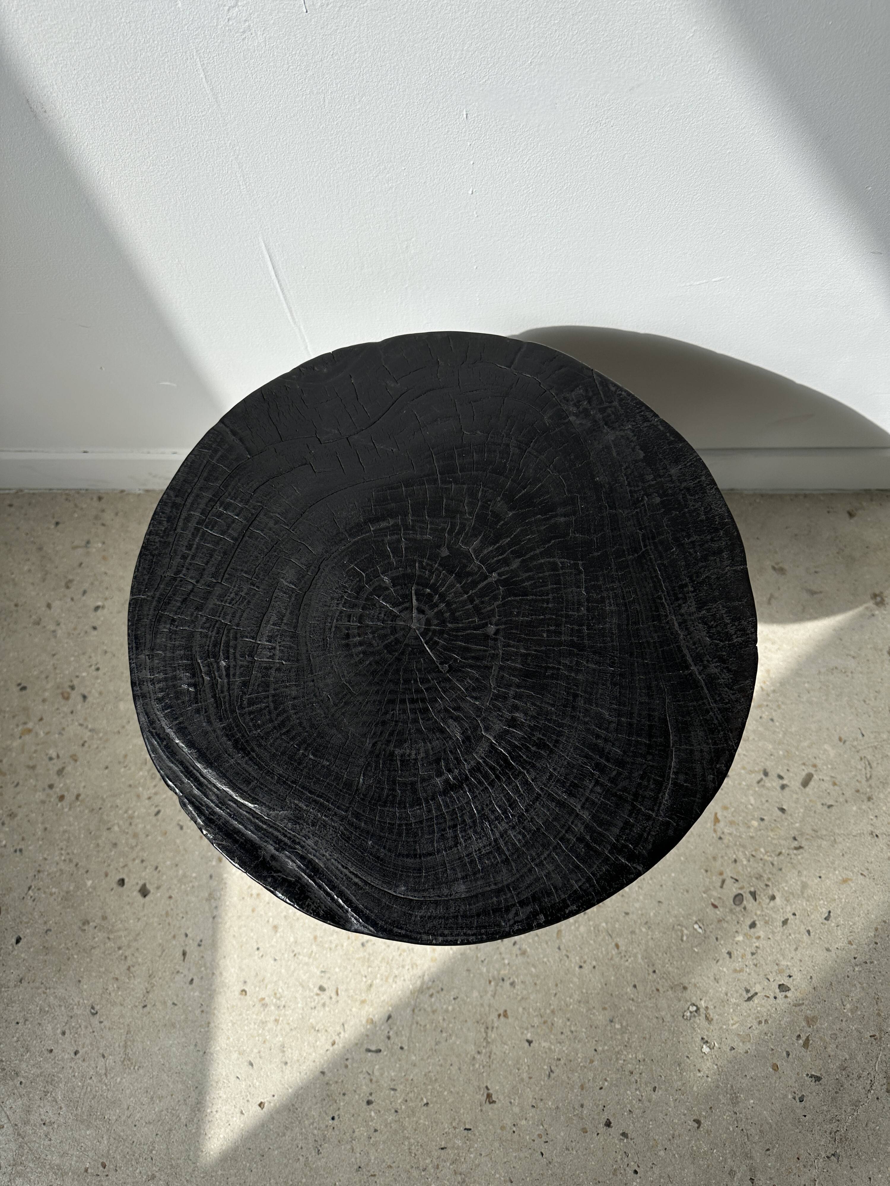 Solid wood (monoxyl) side table, organic shape, black color