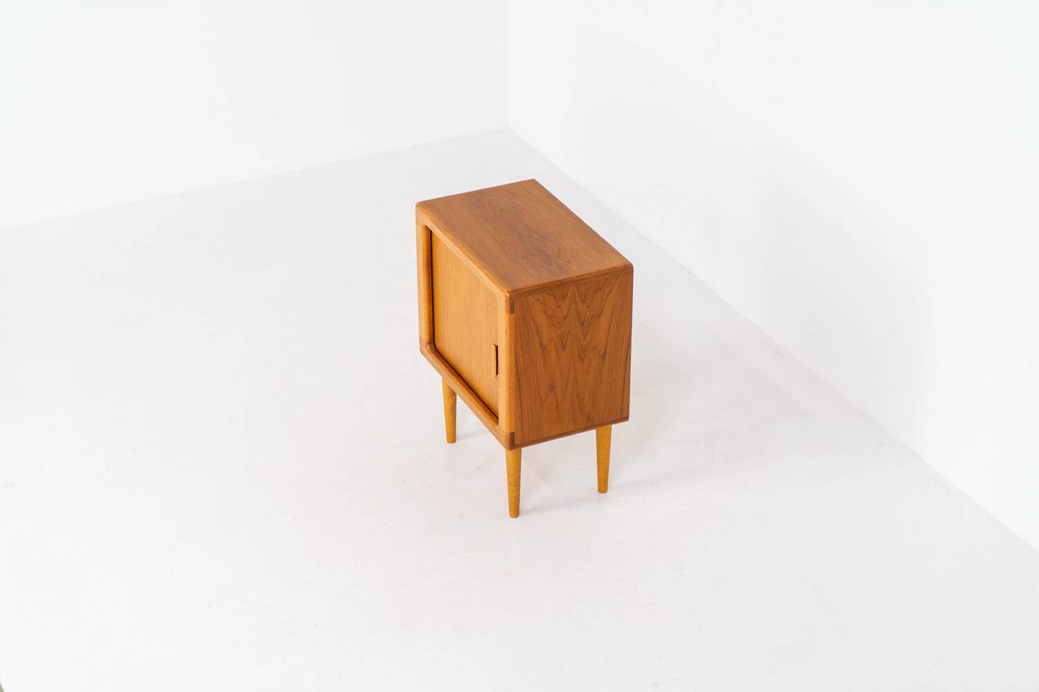 Compact cabinet with tambour door by CFC Silkeborg (Denmark, 1960s).