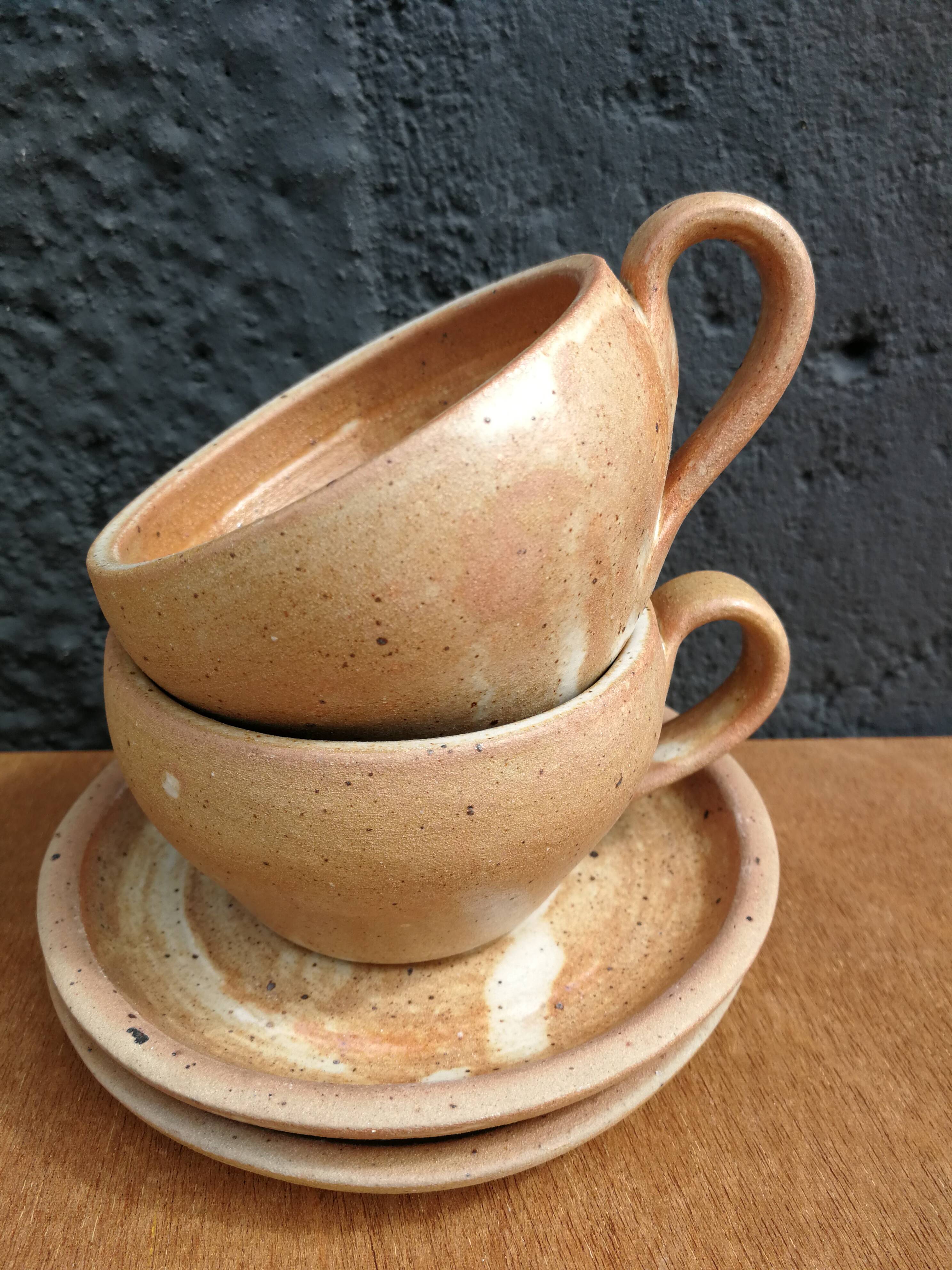 Set of 4 coffee/tea cups and saucers