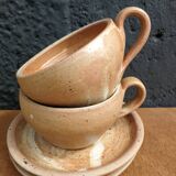 Set of 4 coffee/tea cups and saucers