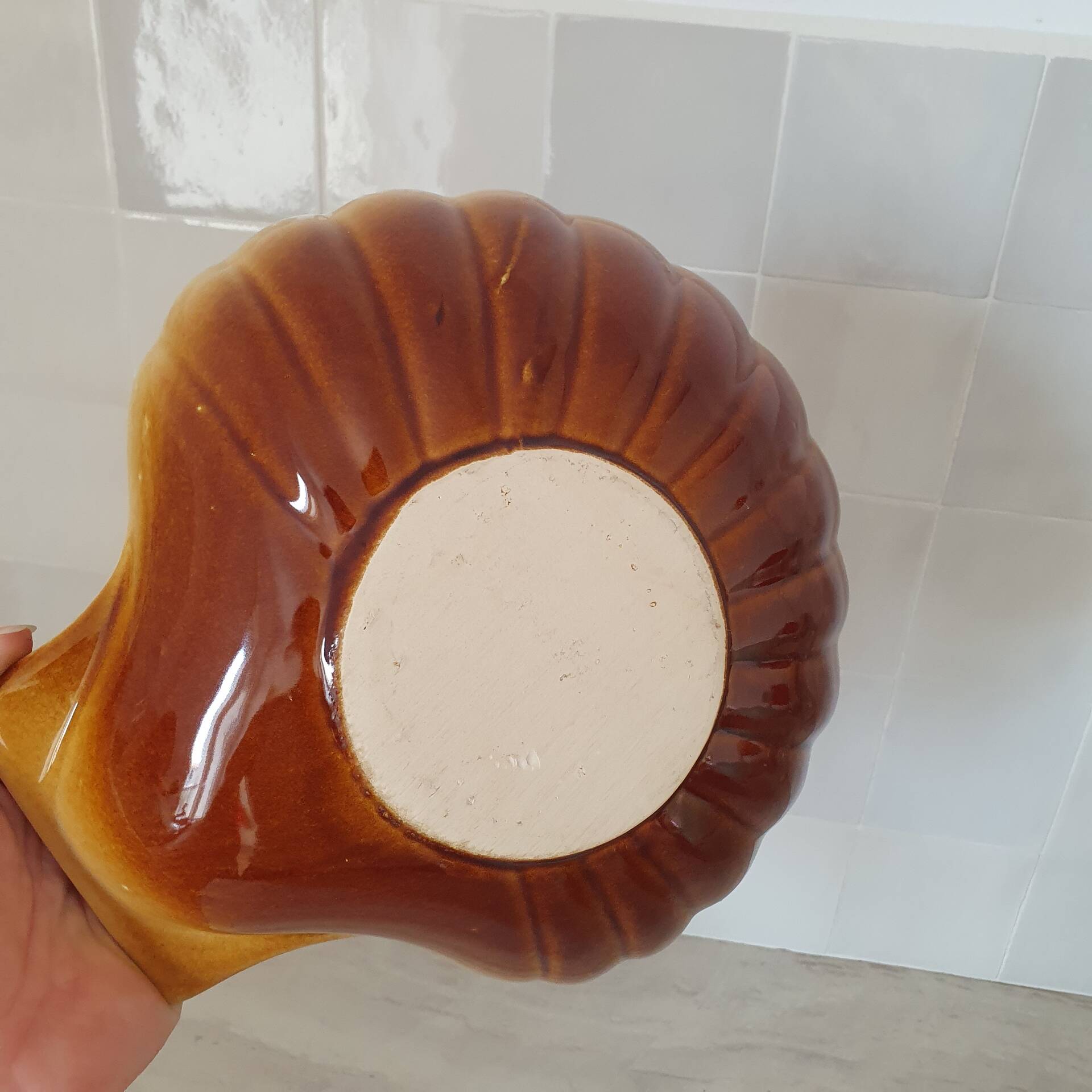 Brown and white ceramic shell bowl