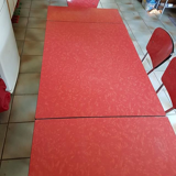 Red formica table and its 4 chairs