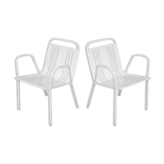 Pair of honeycomb steel armchairs. France, circa 1950.