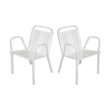 Paire de fauteuils en acier alvéolé France circa 1950