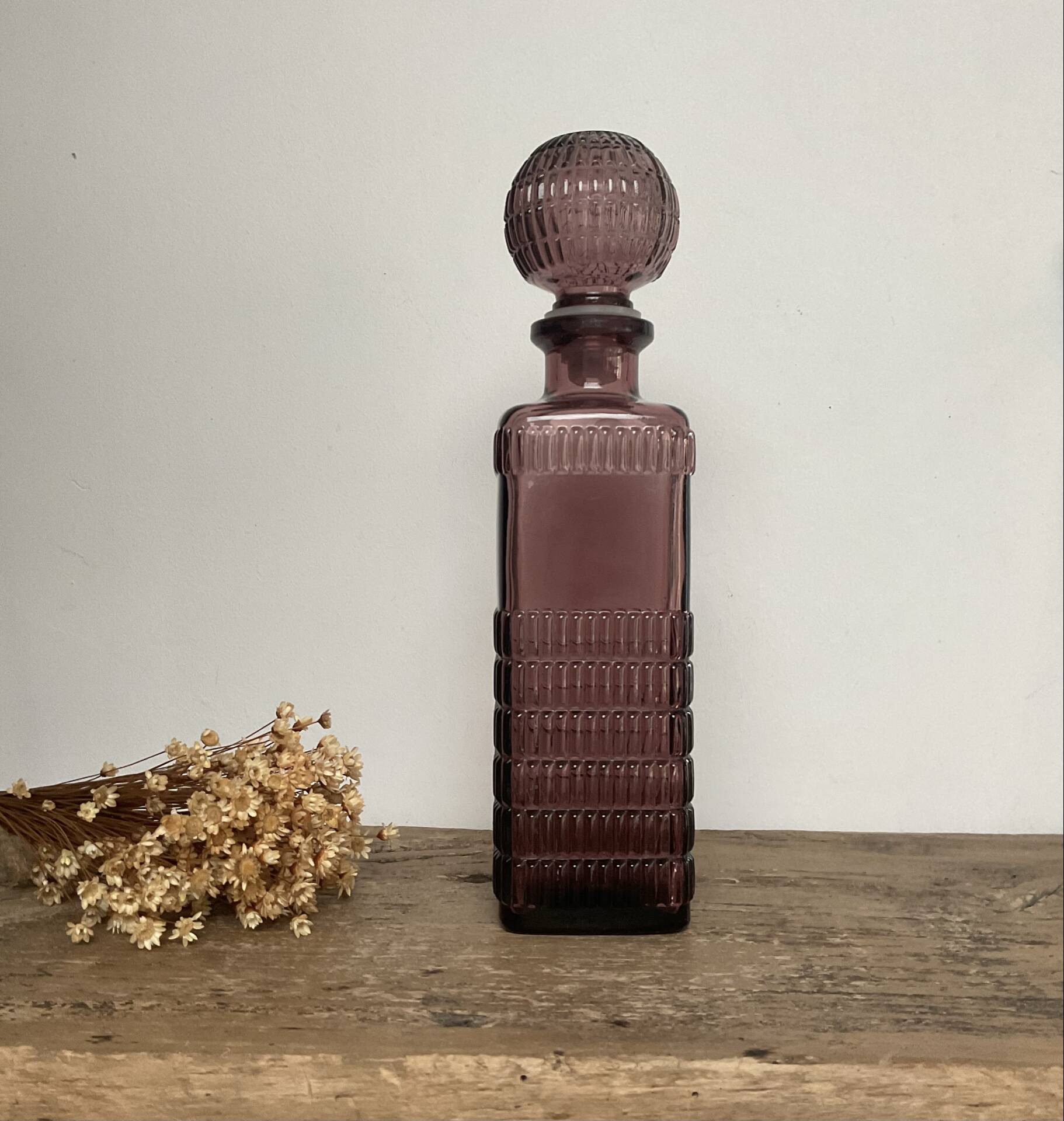 Plum glass bottle