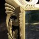 Renaissance style mirror in gilded wood