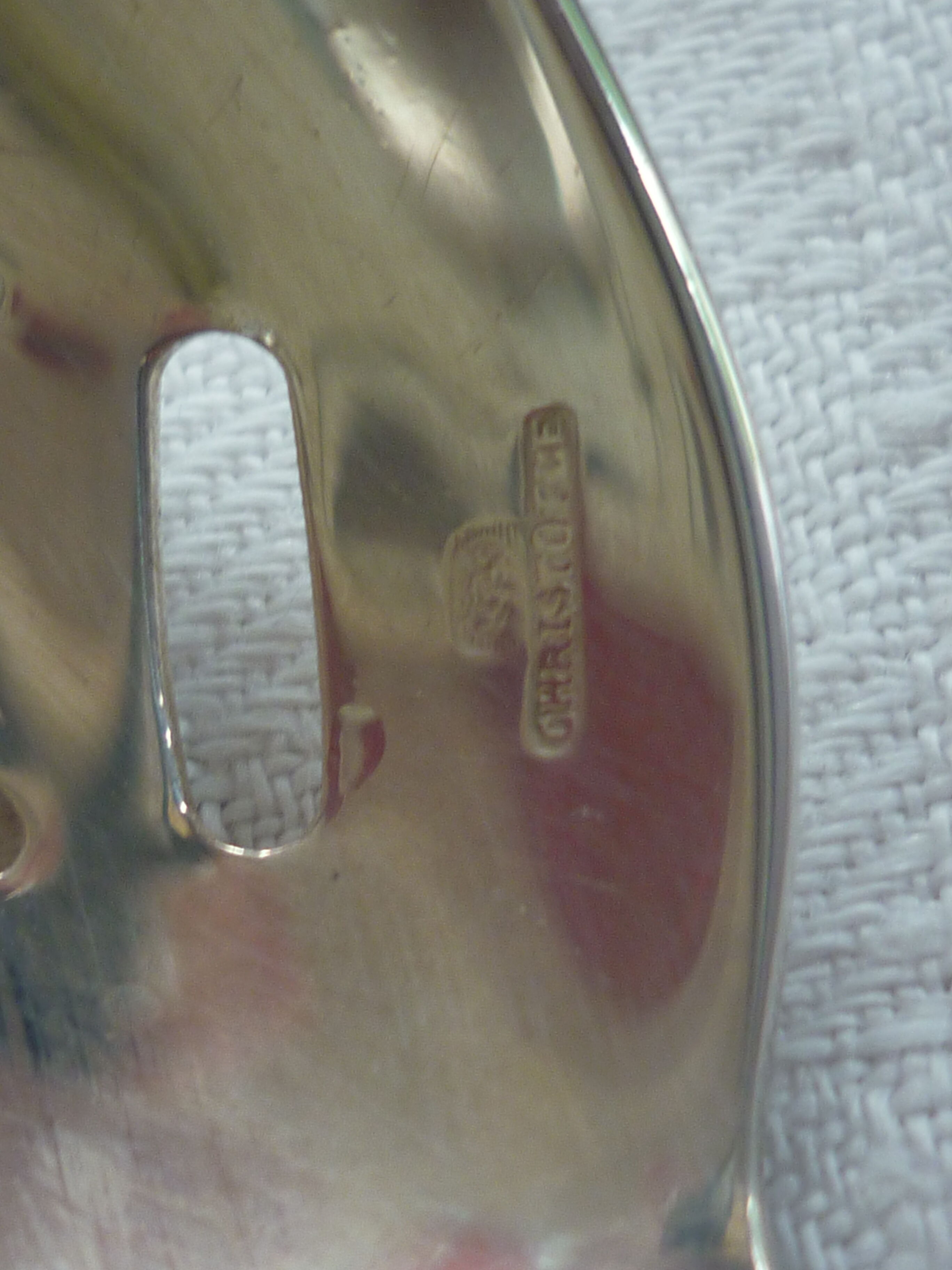 Spoonful with silver metal cubes Christofle