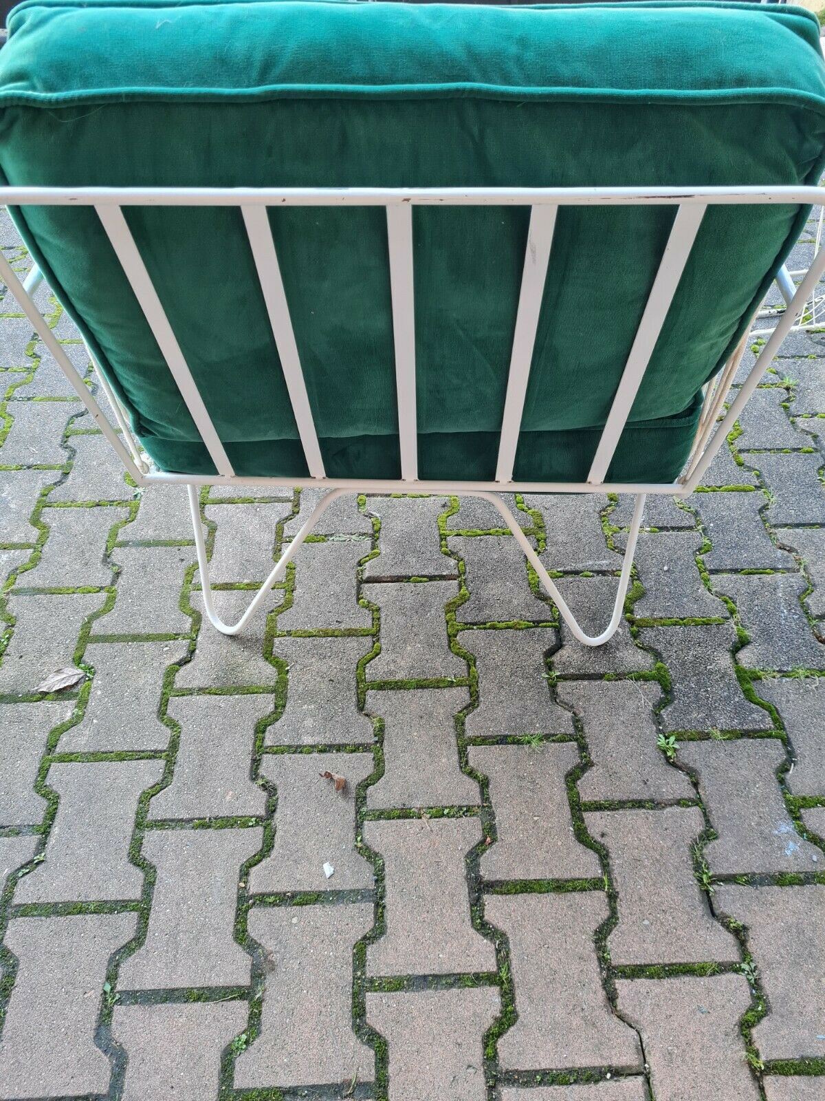 Fauteuil croisette en fer forgé avec coussins en velours vert