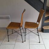 Pair of vintage wrought iron and rattan chairs