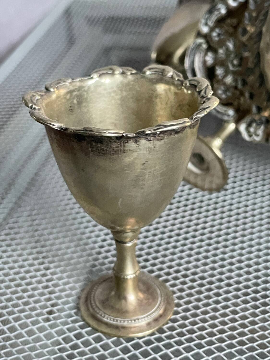 Antique egg set in nickel silver metal