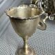 Antique egg set in nickel silver metal