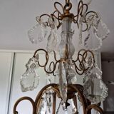 Lustre ancien à 8 bras de lumière à pampilles en bronze et cristal