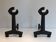 Pair of modernist andirons in cast iron and wrought iron