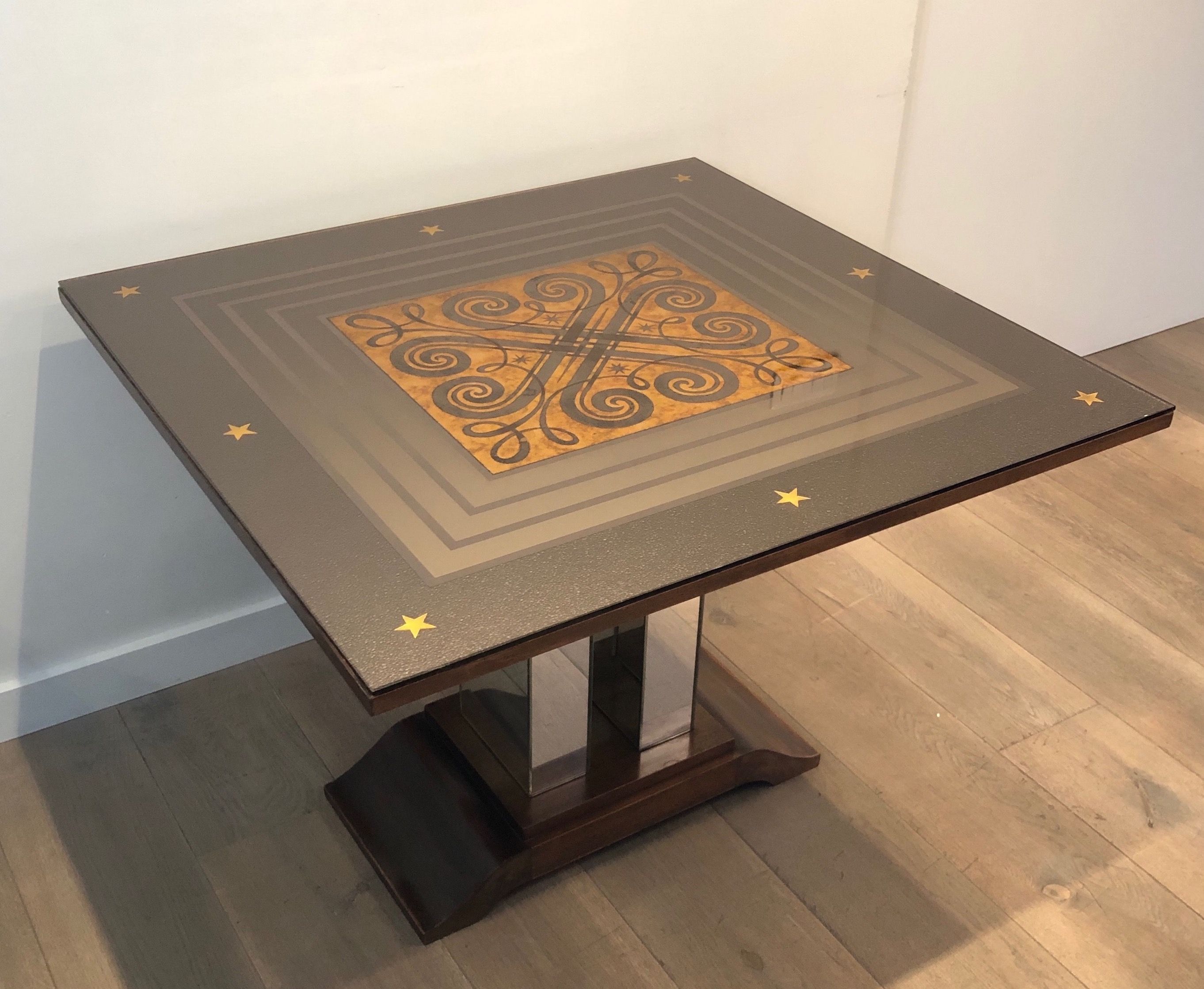 Art Deco centre table with a mirrored eglomisé top in the style of Jules Leleu and Max Ingrand.
