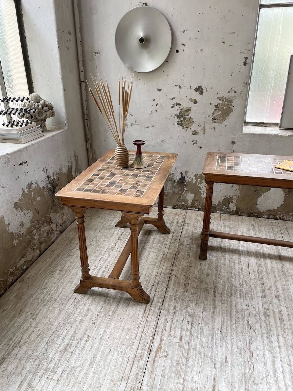 Set of two bistro tables in walnut and tiling from 1890.