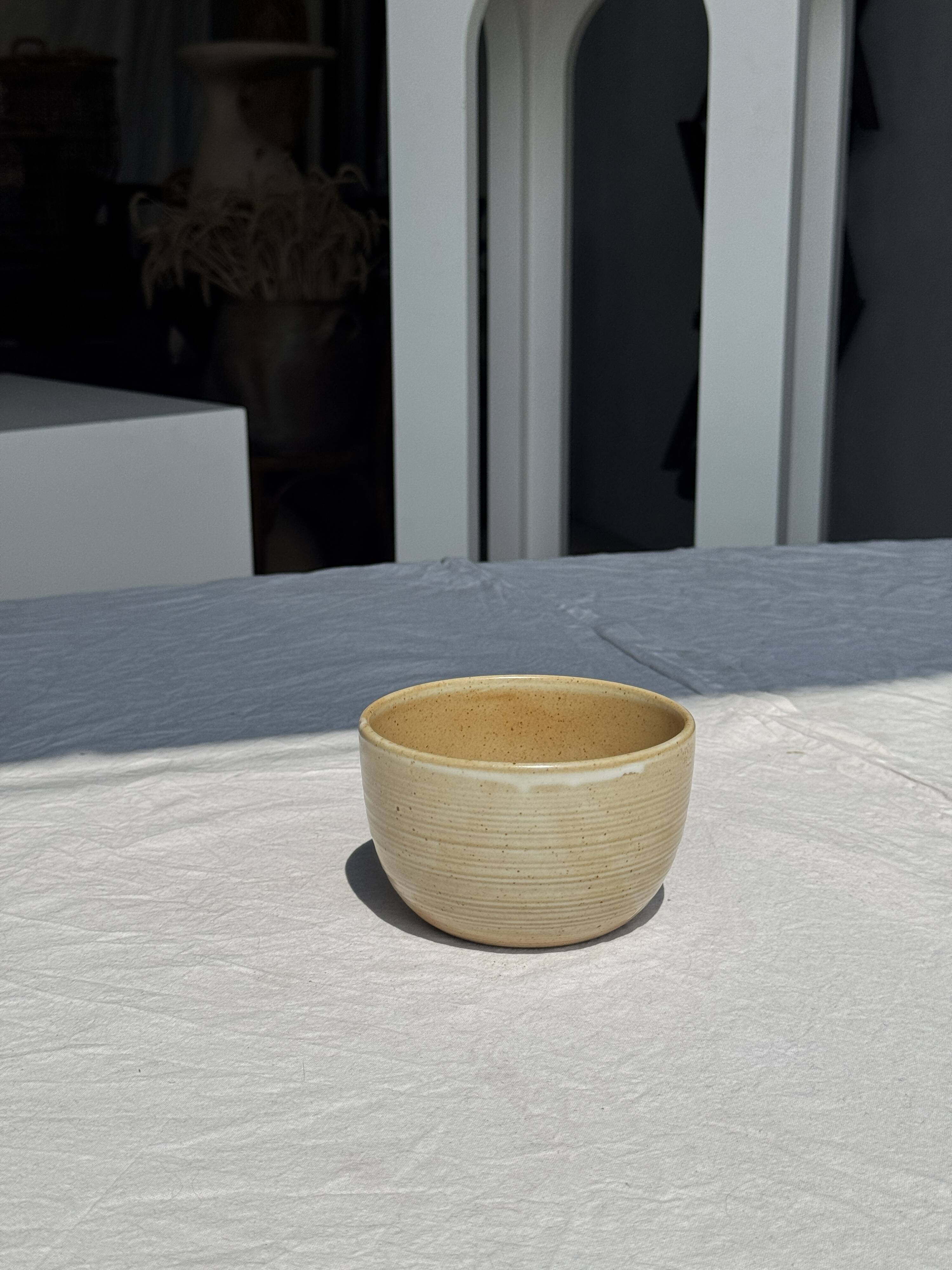 A small tall beige bowl CNP Grès Village France vintage D12