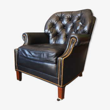 Chesterfield style leather armchair & footstool by Hancock & Moore