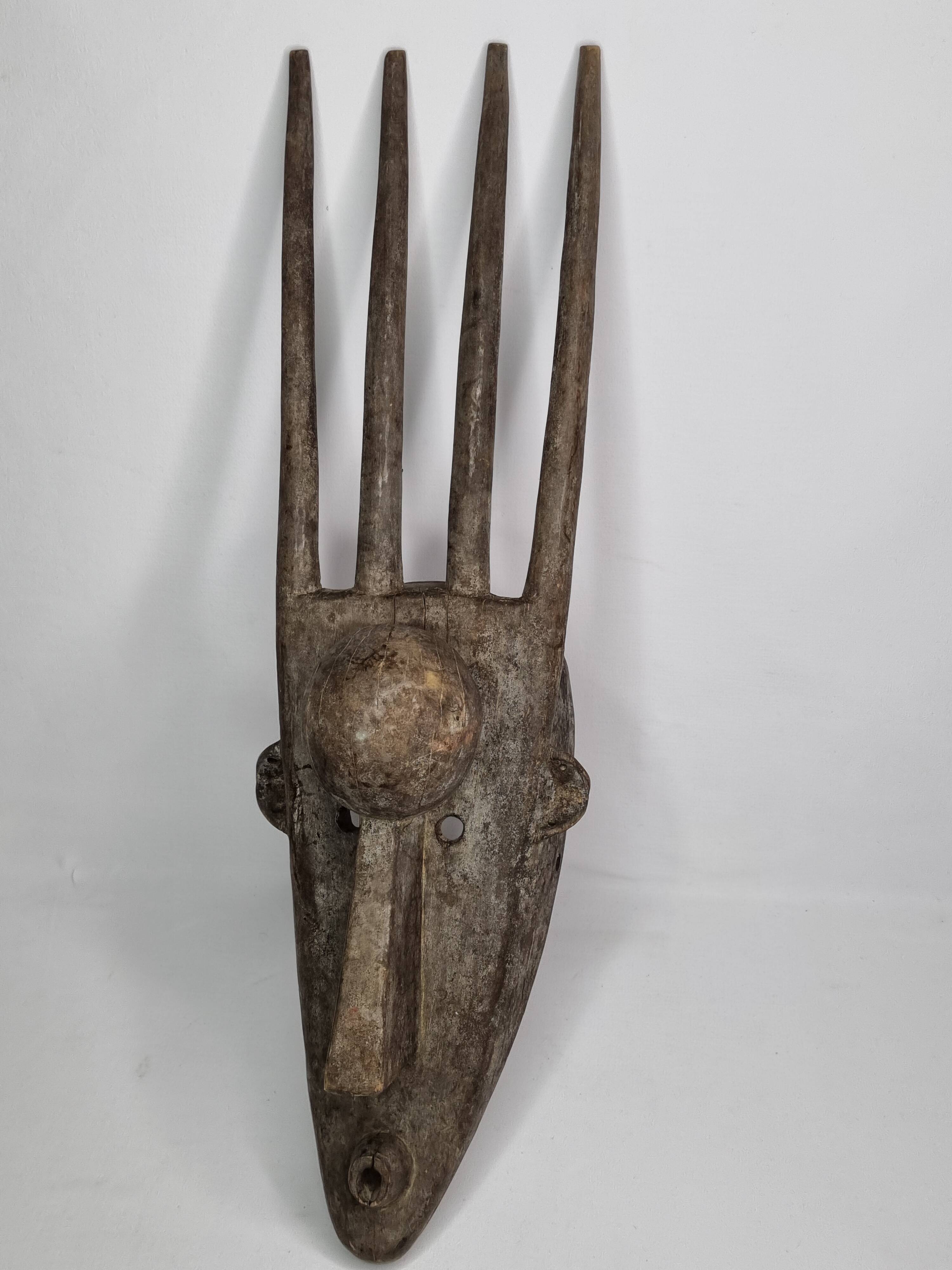 N'Tomo Bambara Mask, Mali, Carved Wood, Antique Patina, 20th Century, 64 cm