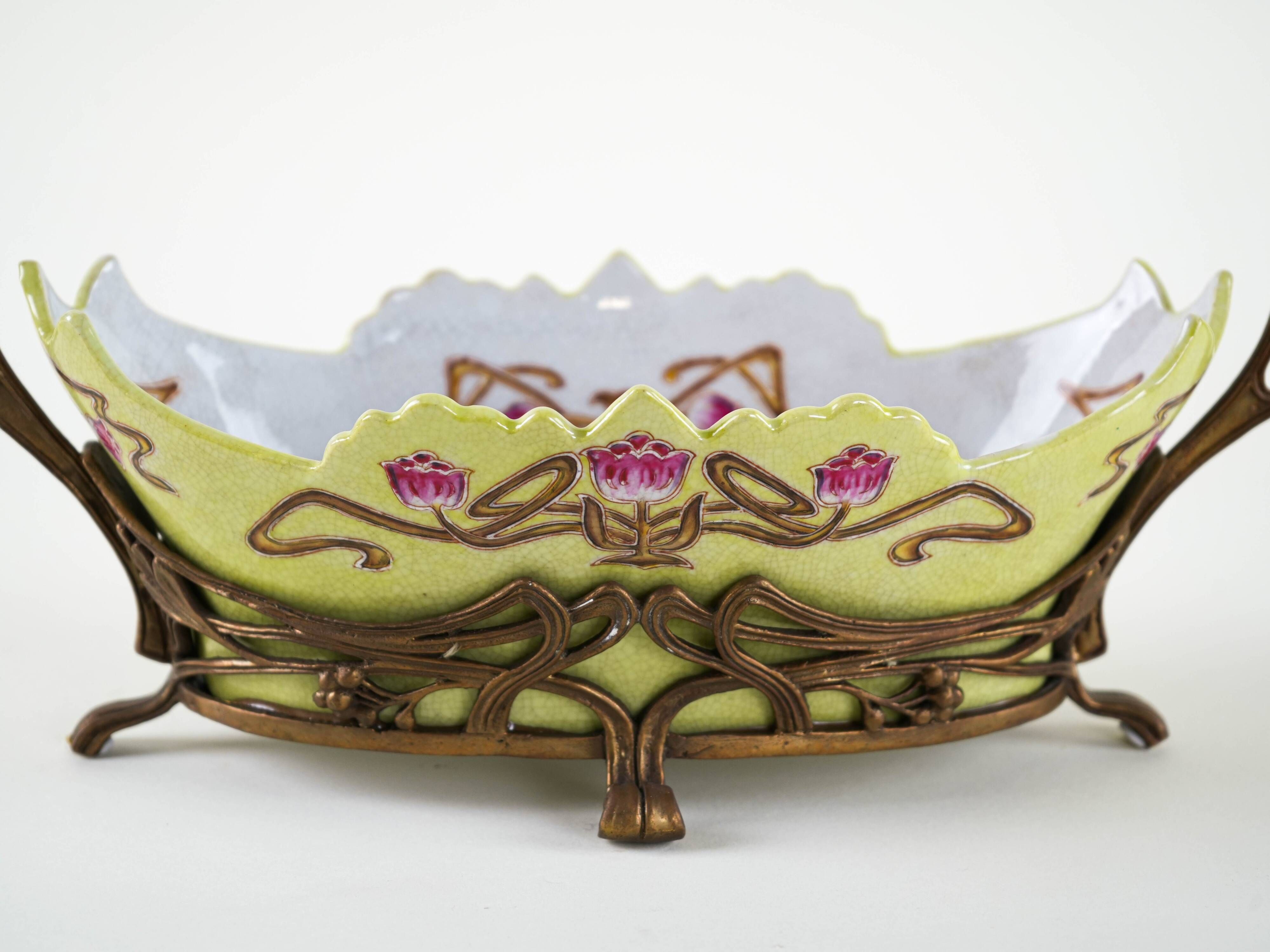 Art Nouveau ceramic platter with glazed golden finish in decorative metal frame, European