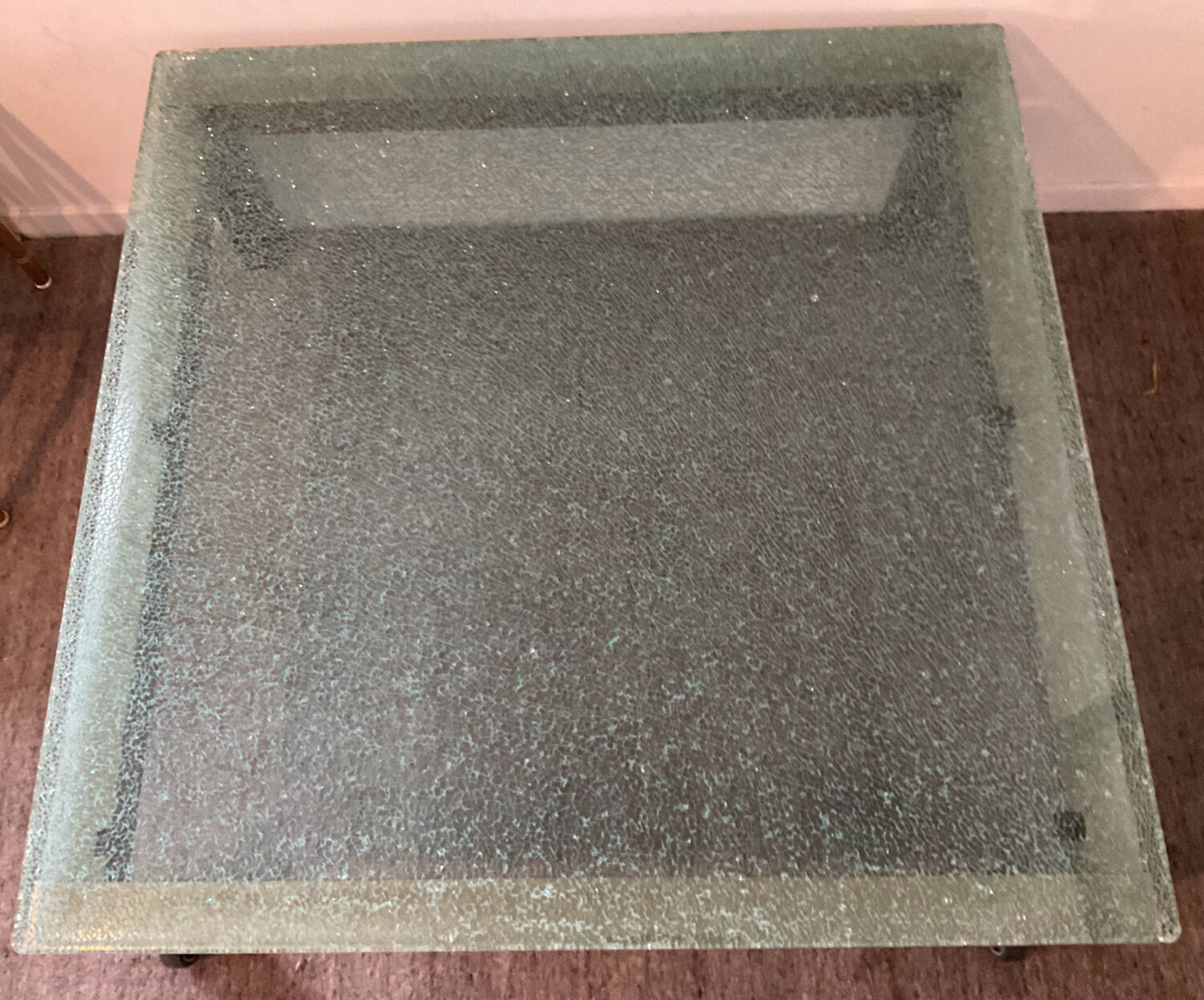 Designer garden coffee table in tempered glass and stainless steel