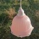 Baladeuse vintage en verre moulé rose