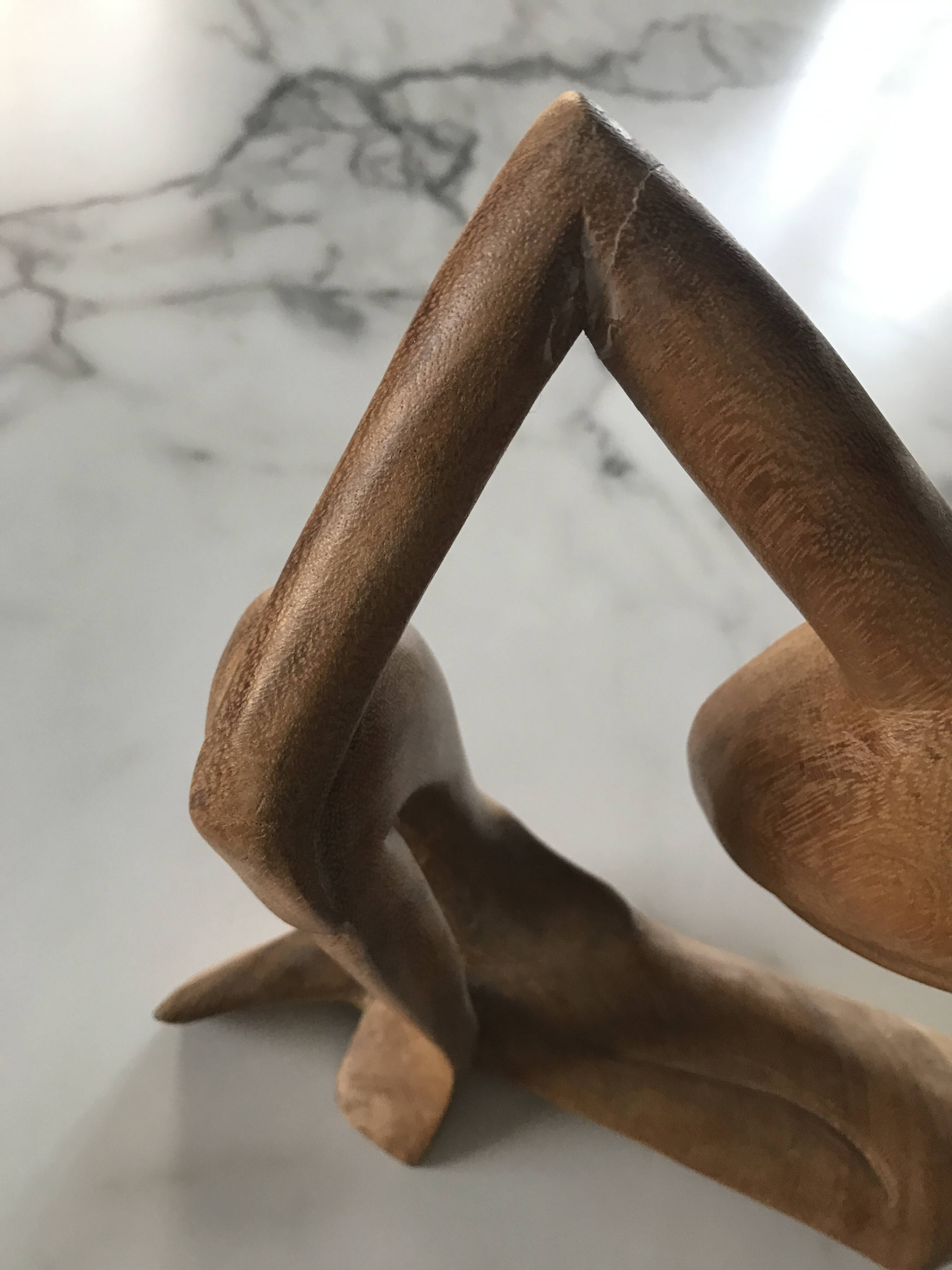 Pensive man wooden statue