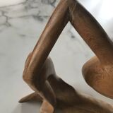 Pensive man wooden statue