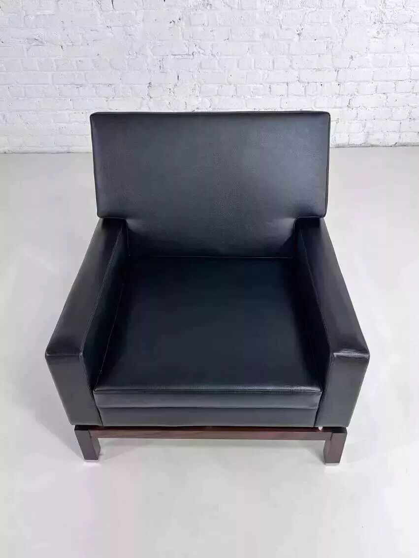 Pair of 50s-60s armchairs in imitation leather, wood and chrome