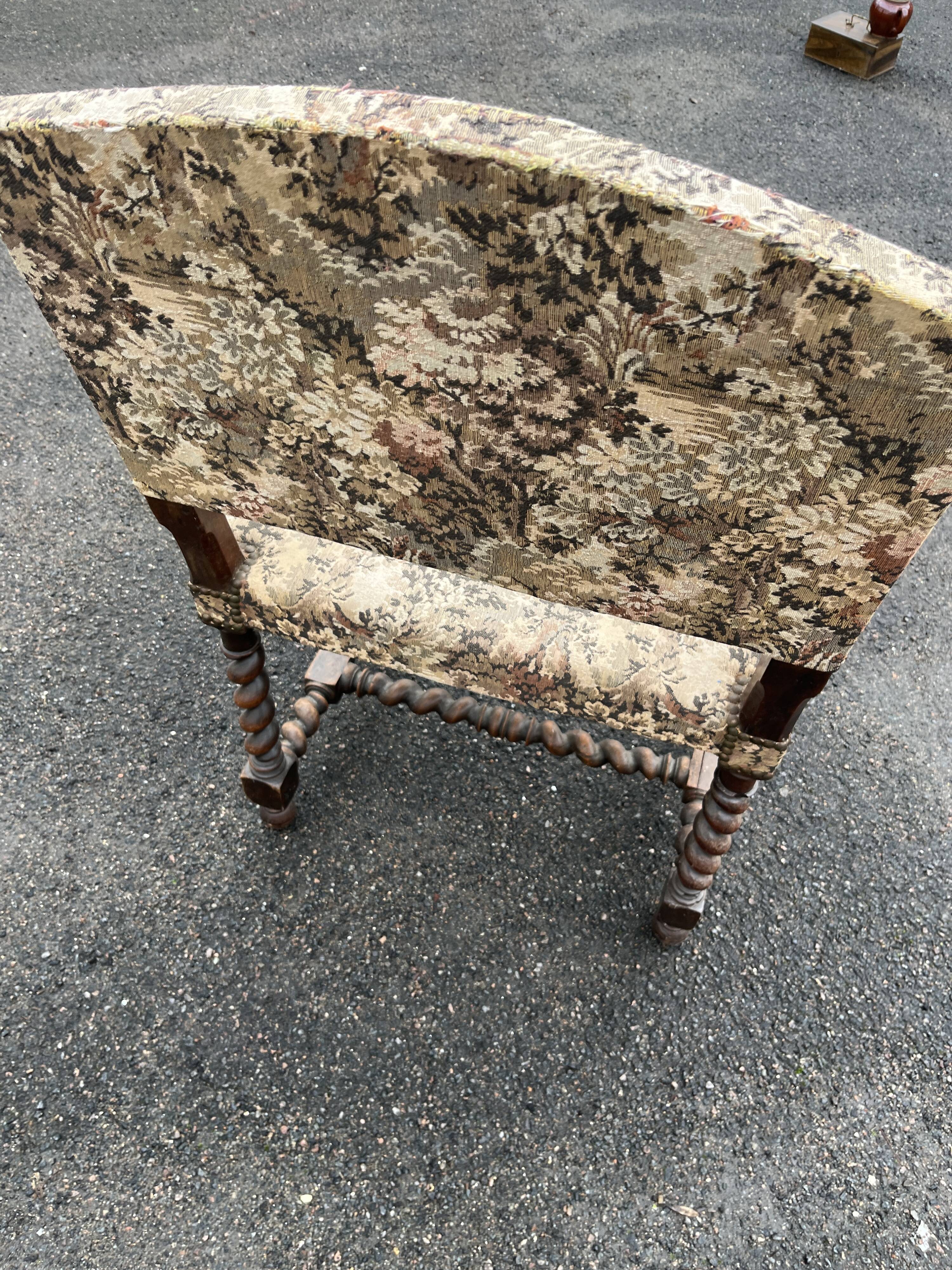 Louis XIII style armchair with twisted backrest and legs.