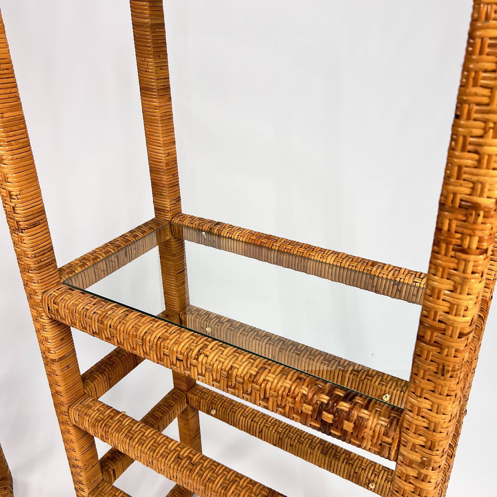 Set of 2 mid century tall wicker and glass etagere cabinet, 1970s