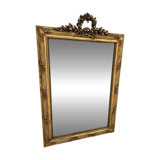 Miroir de style Louis XVI en bois et stuc doré XIX siècle