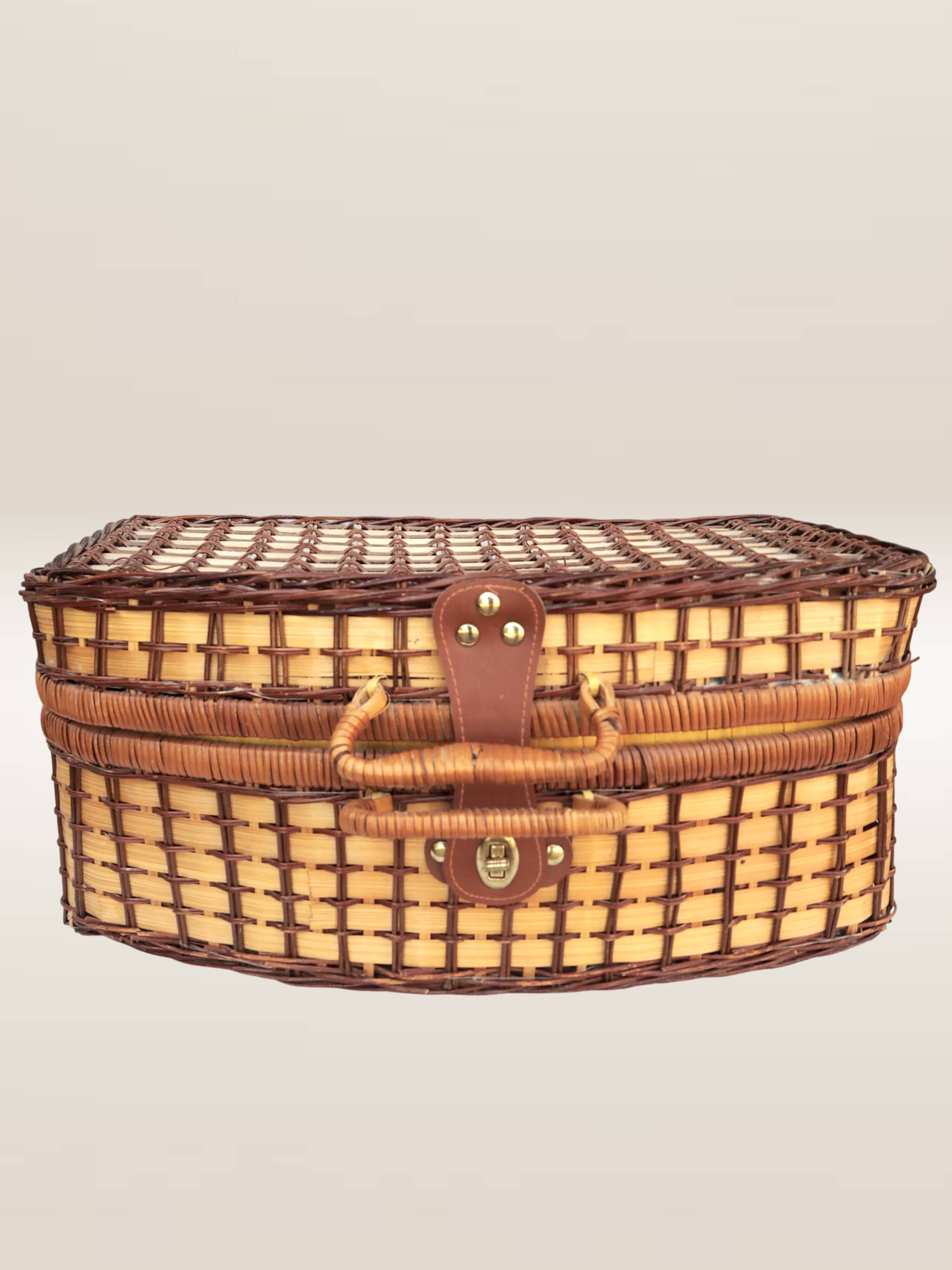 Wicker picnic basket, blue gingham interior.