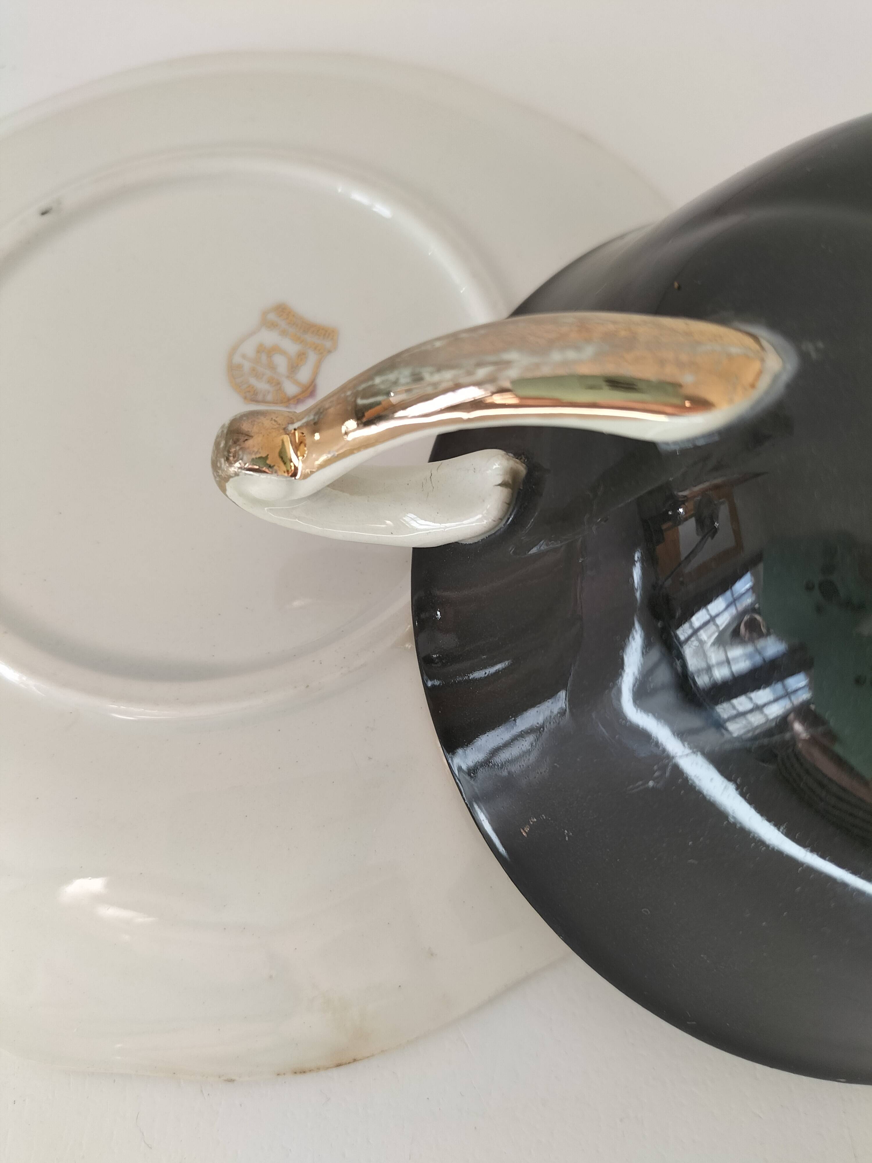 Large black, yellow iridescent and white Art Deco Saint-Amand cup.