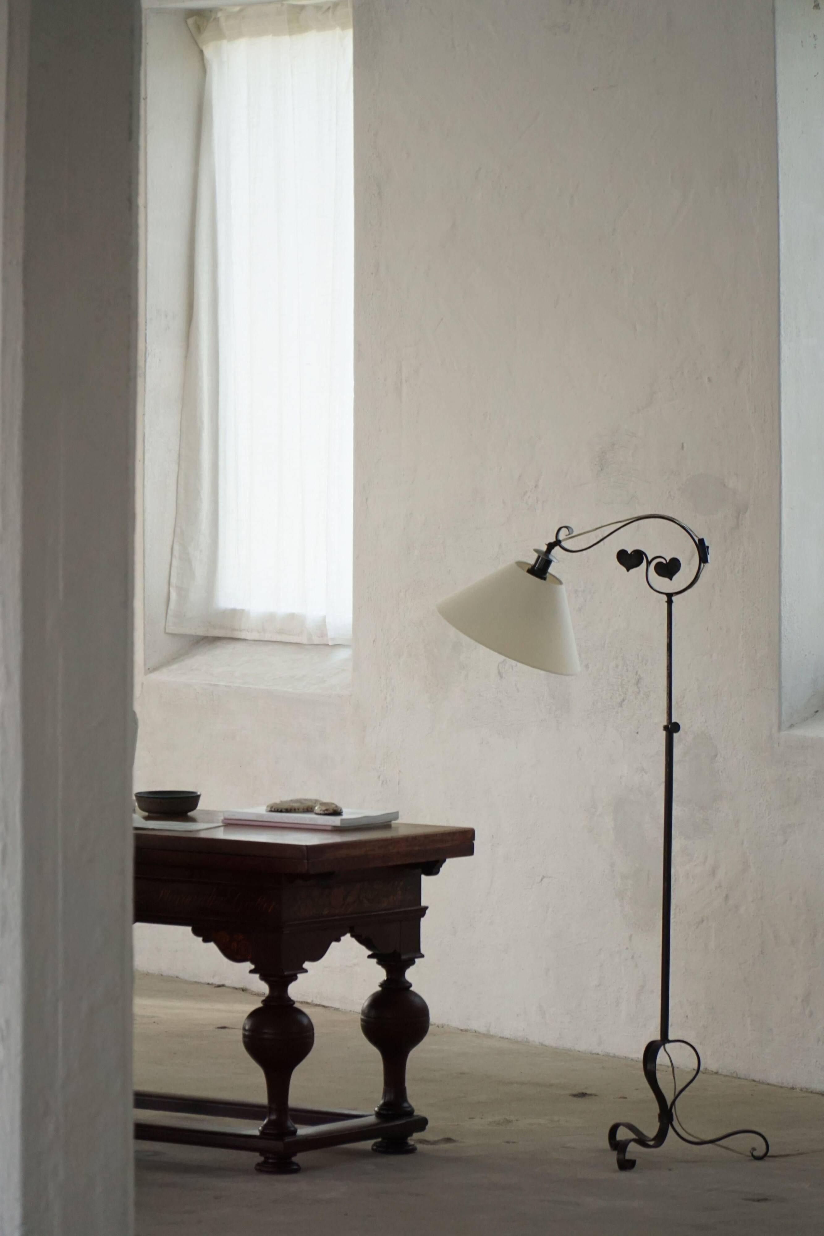 Danish Art Deco, adjustable wrought iron floor lamp, 1930s