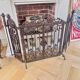 Wrought iron fire screen set with log basket, accessories.