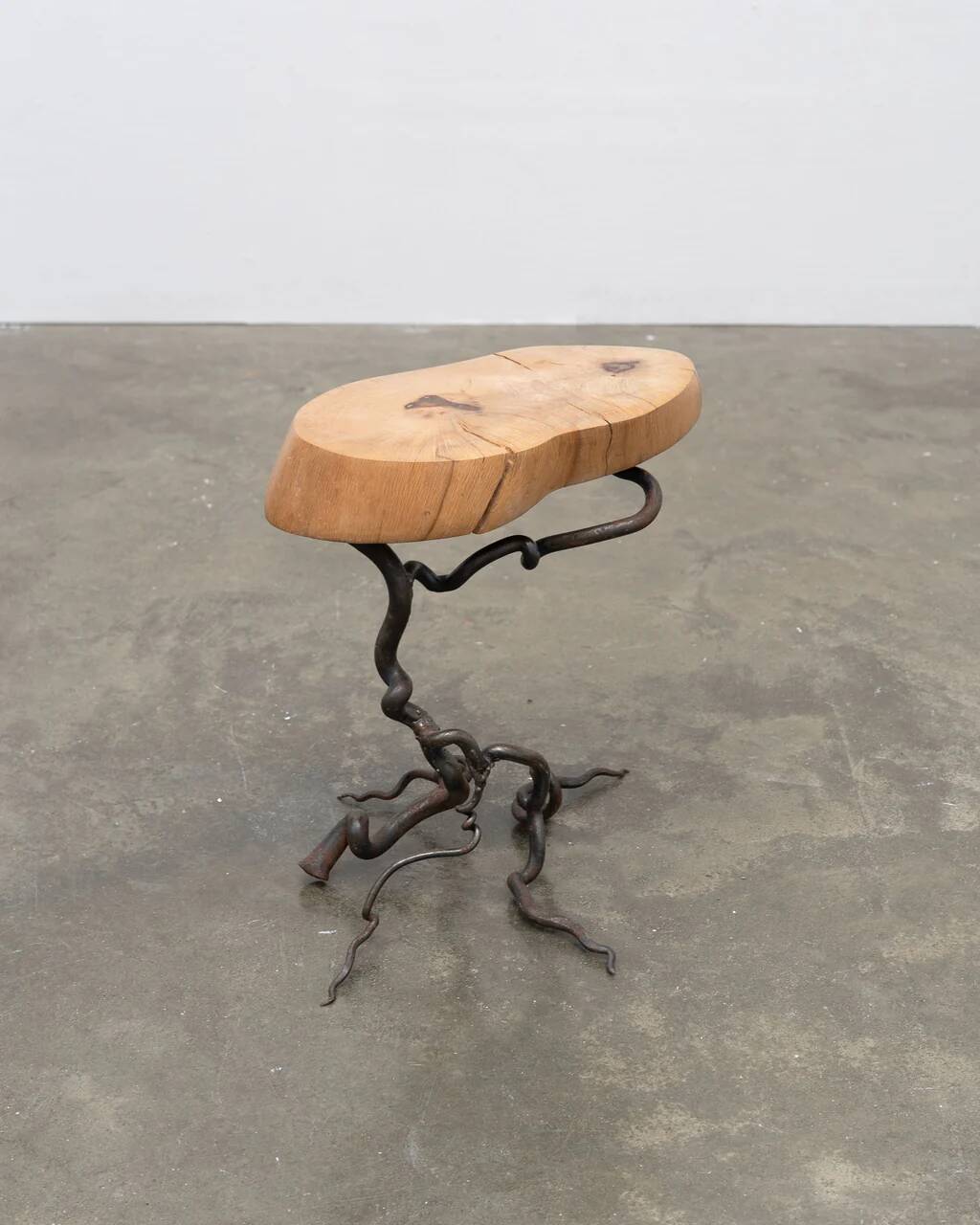 Brutalist artisanal wrought iron and slab wood side table