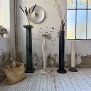 Set of 4 marble columns or pedestals.
