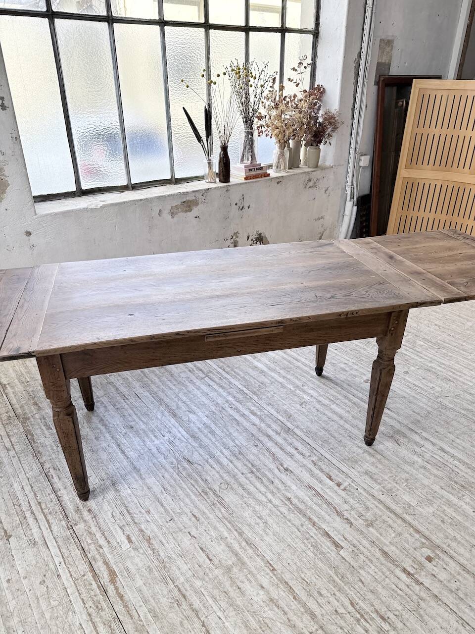 Solid oak farmhouse table with integrated extensions 1950