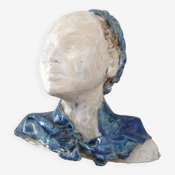 Enamelled ceramic female face bust