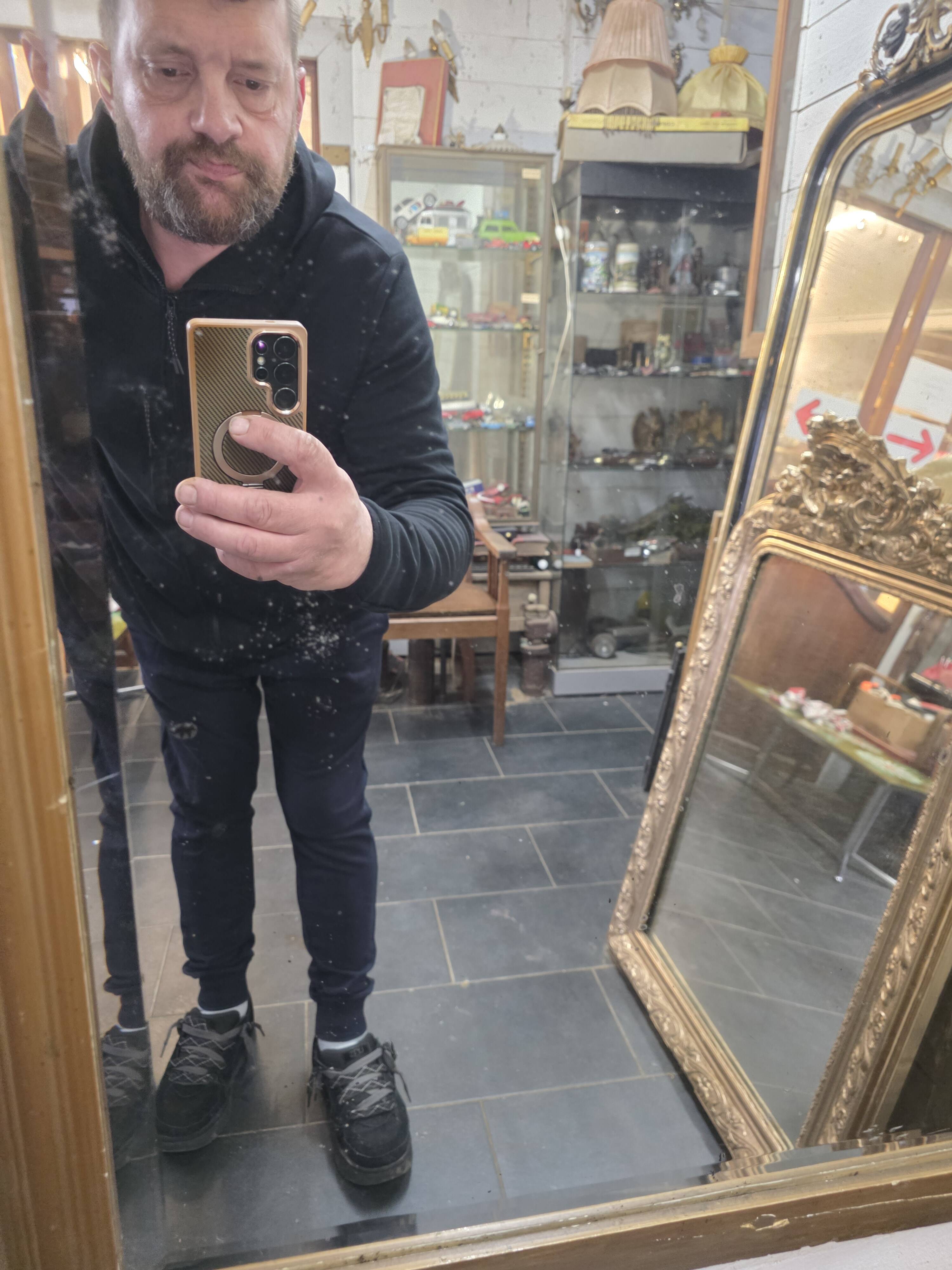 Art Deco gilded trumeau, bevelled mirror