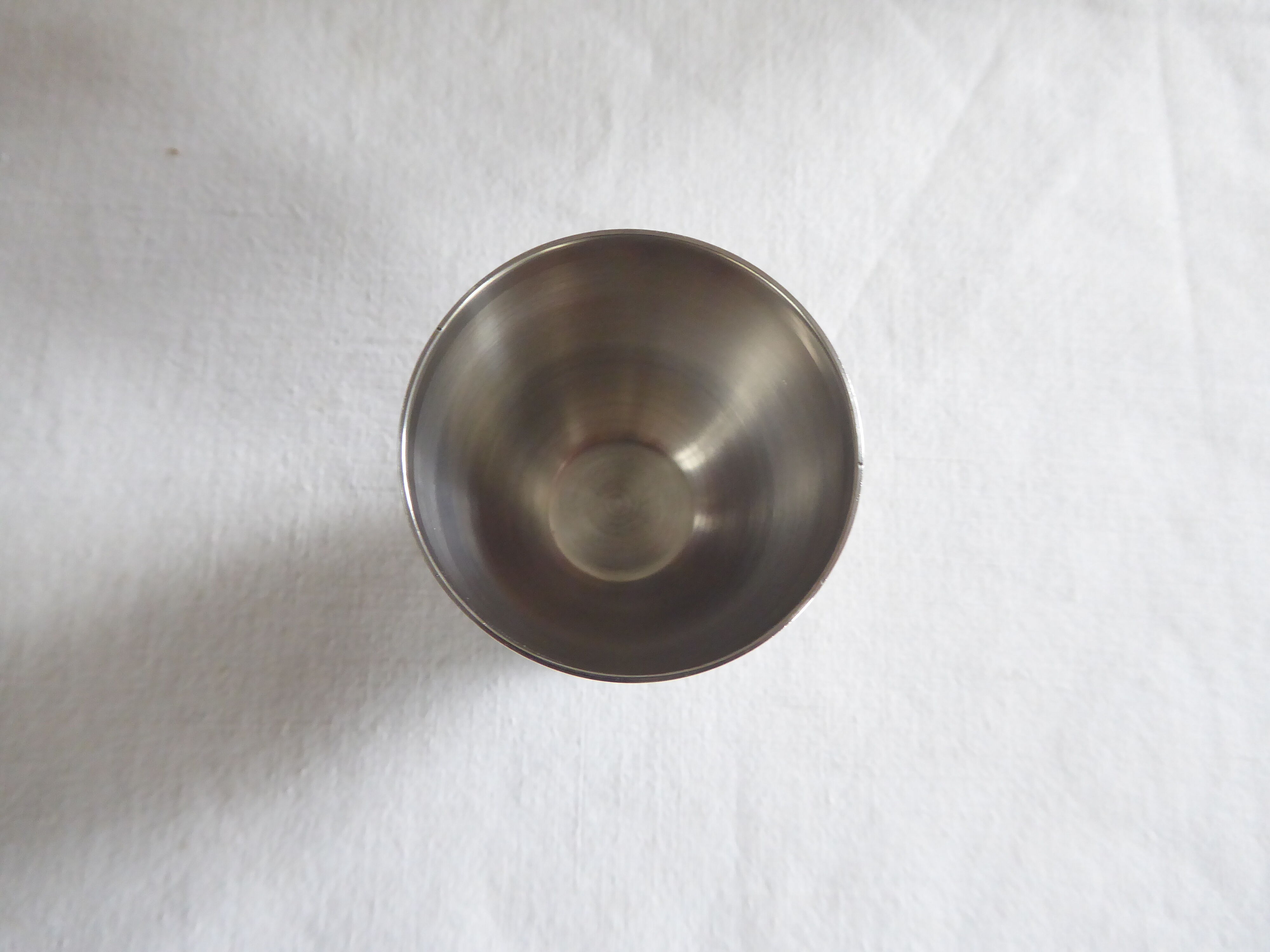 Cockerel + silver metal spoon