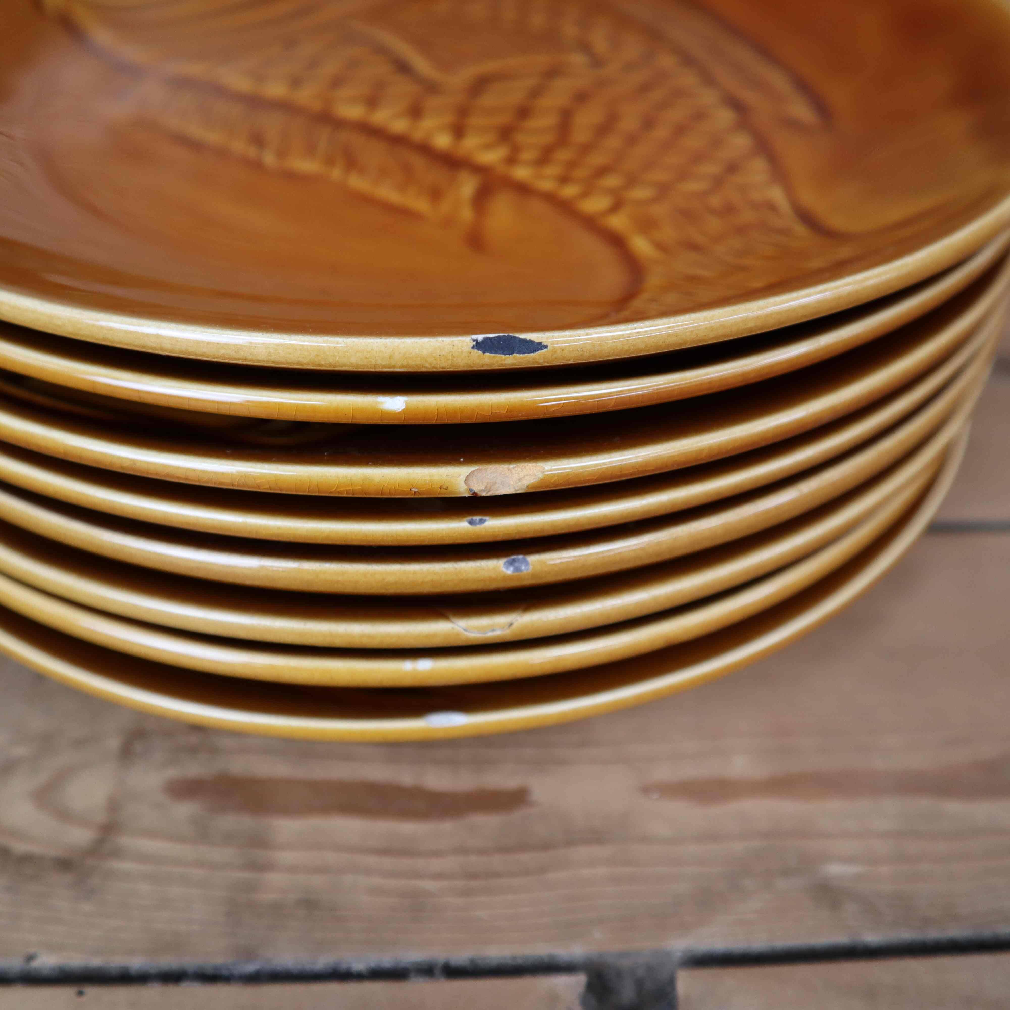 8 glazed flat plates with vintage fish decoration Saint Amand