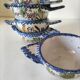 5 mini earthenware bowls from Charolles decorated with a village and rooster.