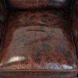 Set of two marbled cowhide leather Chesterfield armchairs in English style