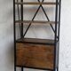 Industrial shelf made of solid exotic mango wood with riveted metal.