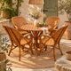 Ensemble de jardin vintage en rotin tressé –table ronde et 4 fauteuils