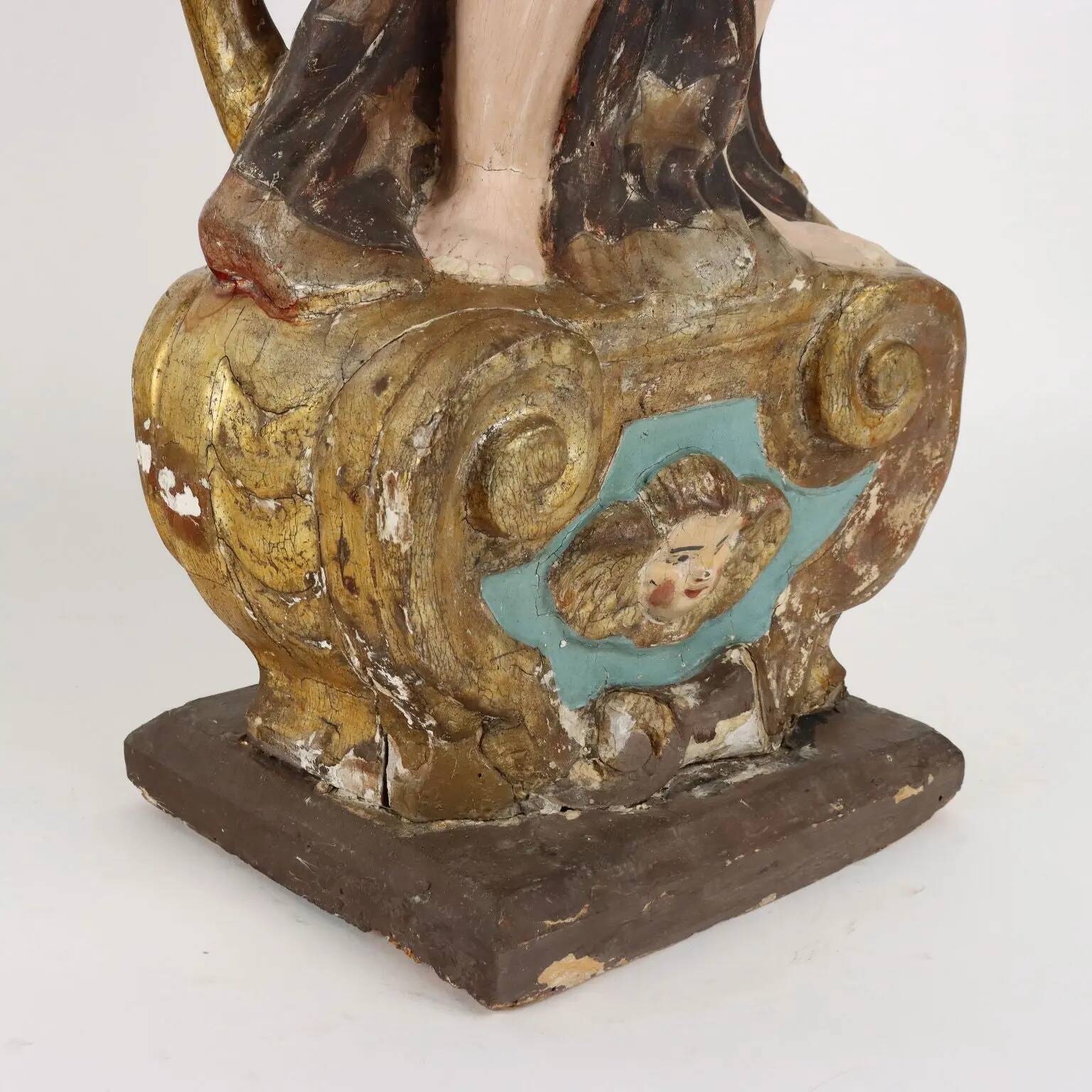 Antique wooden lacquered angel-shaped candlesticks, 18th century.