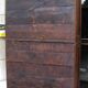 Antique solid wood wardrobe in historical rustic style from the 19th century.