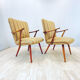 A pair vintage cocktail chairs with stripes and metal screws